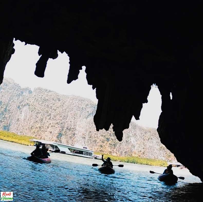 Canoeing through Talu Caves